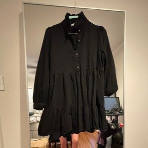 Ruffle hem black shirt dress